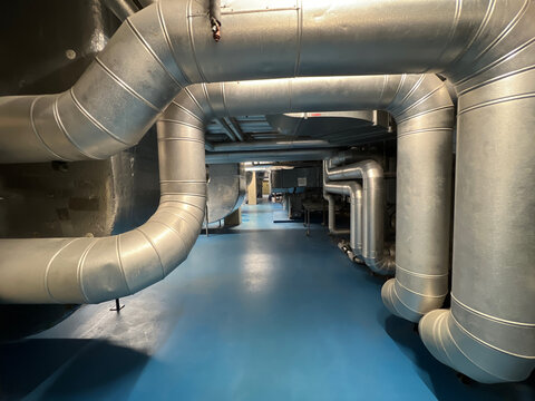 Heating cooling and ventilation pipes in a machine room of a large hospital 