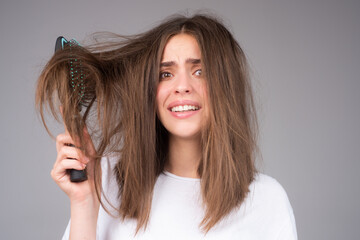 Woman with comb and problem hair, Hair care and hair loss concept. - obrazy, fototapety, plakaty