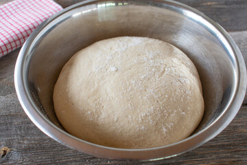 Risen  yeast dough in a bowl