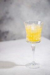 Fresh pineapple cocktail in the glass with ice and mint, summer drink