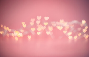 Fototapeta Blurred hearts lights. Valentines day pink Bokeh background obraz