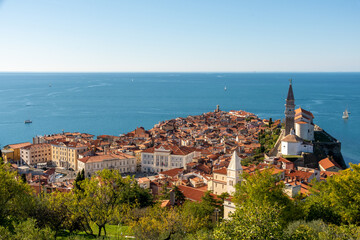 The coastal town Piran in Slovenia and the mediterranean sea in the background