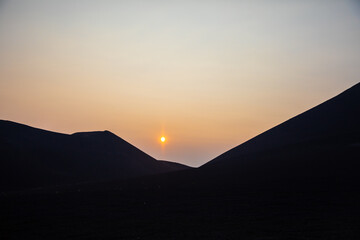 Sunset in the mountains of volcano