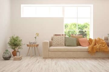 Minimalist living room in white color with sofa and summer landscape in window. Scandinavian interior design. 3D illustration