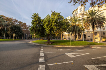 Barcelona street in the early morning. City traffic on weekends. Empty streets in Barcelona.