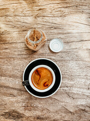 cup of coffee on a wooden table