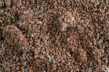 unhealthy granulated instant coffee grounds spoiled by mold