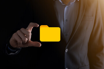 Businessman hold folder icon.Document Management System or DMS setup by IT consultant with modern...