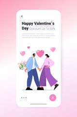 loving couple celebrating happy valentines day man woman in love standing together with flowers vertical
