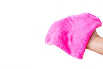 Abstract male hand holding pink microfiber cleaning cloth on white. Background copy space for add text or art work design.