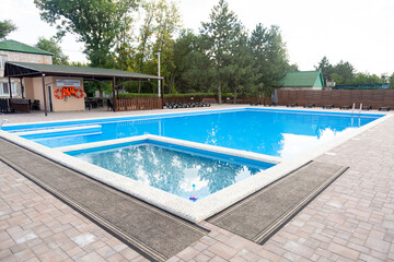 Swimming pool with two zones near hotel