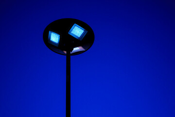 solar cell led light pole with blue sky at night. Renewable Energy concept.