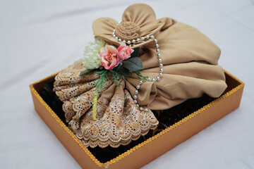 Fototapeta na wymiar delivery of a set of typical Indonesian kebaya cloth for the bride