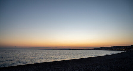 Sunset over Nice beach in winter on the French Riviera