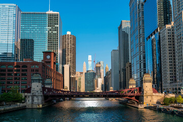 Fototapeta na wymiar Panorama cityscape of Chicago downtown and River with bridges at day time, Chicago, Illinois, USA. A vibrant business neighborhood