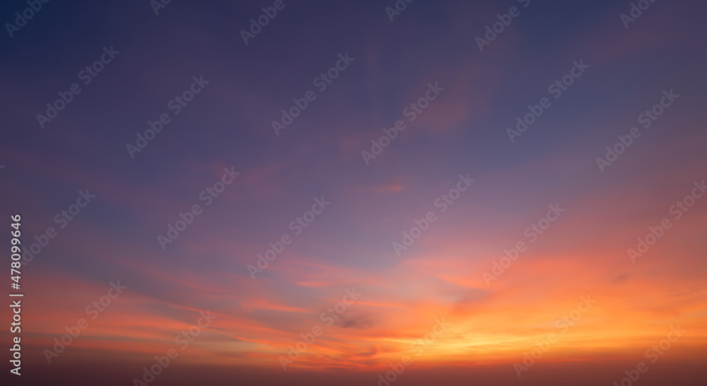 Wall mural sunset sky. abstract nature background. dramatic blue with orange colorful clouds in twilight time.