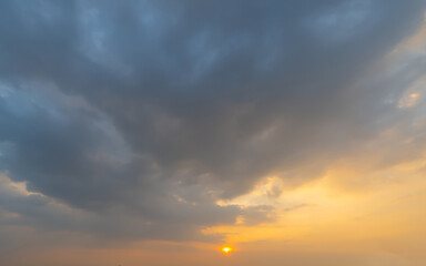 Sunset sky. Abstract nature background. Dramatic blue with orange colorful clouds in twilight time.