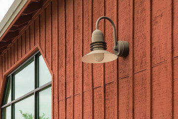 Barn light on a warehouse wall