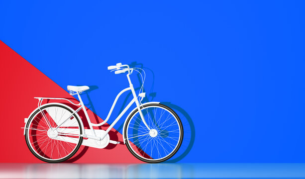 White bicycle on colorful wall background.