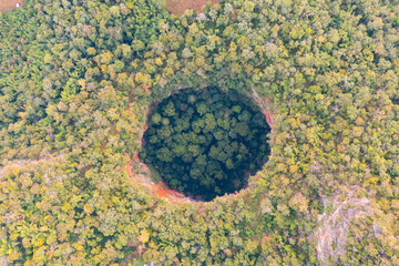Aerial top view of Spirit Well Cave, Pang Mapha District, Mae Hong Son, Thailand. Tourist attraction landmark. Nature landscape background.