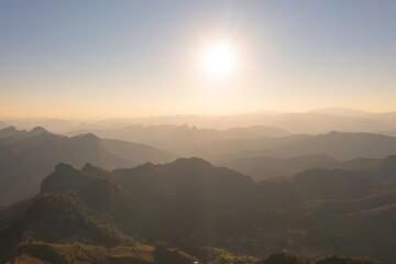 Aerial top view of forest trees and green mountain hills. Nature landscape background, Thailand.