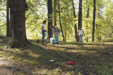 People cleaning up the forest together