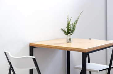 Part of the kitchen interior in white.