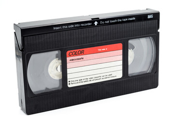 Used VHS cassette isolated on white, close up