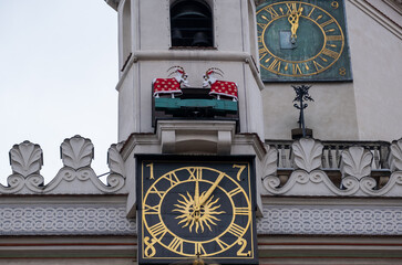 Goats in Christmas dress on Poznan`s Town Hall with a beautiful mechanical clock