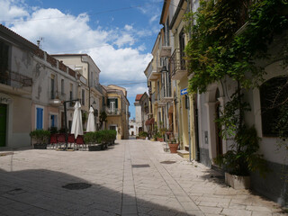 typical street with colorful buildings of the historic center inside the Swabian Castle in Termoli - obrazy, fototapety, plakaty