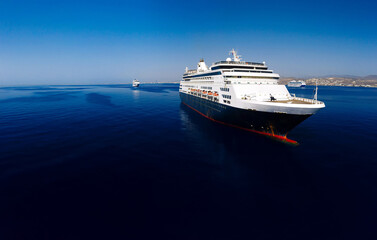 Fototapeta na wymiar Large cruise liner in deep blue waters near the coast of Limassol, Cyprus