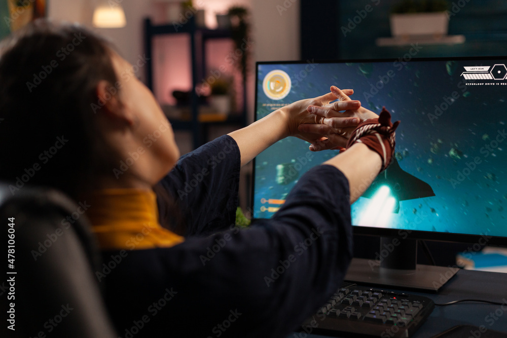 Aufkleber gamer preparing to play online video games on computer. woman using keyboard and mousepad, playing d