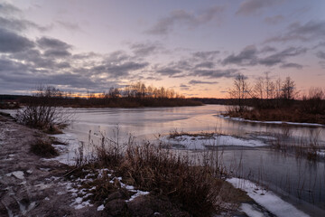 sunrise over the river in winter