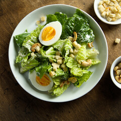 Healthy green salad with cashew and hard boiled eggs