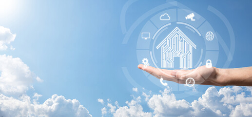 Businessman hold house icon.Smart home controlled, intelligent house, and home automation app...