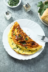Traditional homemade omelette with herbs