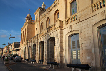 Fototapeta na wymiar ancient stone building (museum) in vittoriosa in malta