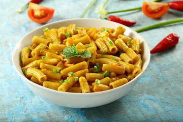 Bowl delicious vegan diet meal- cheese pasta penne with herbs.