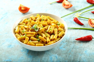Bowl delicious vegan diet meal- cheese pasta penne with herbs.