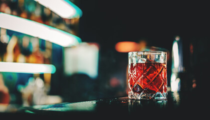 Cocktail Negroni with gin, campari martini rosso and orange. negroni cocktail at the bar