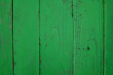 Wooden surface from boards painted green, background
