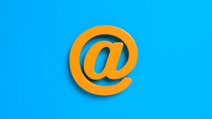 Orange-colored @ symbol. On blue-colored background. Horizontal composition with copy space. Isolated with clipping path.