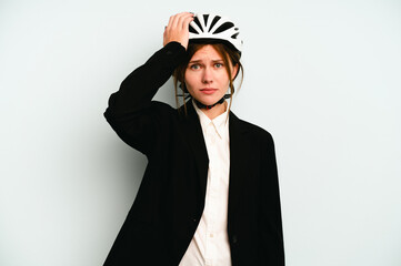 Young business English woman isolated on blue background being shocked, she has remembered...