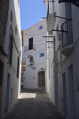 Fototapeta na wymiar narrow street in the old town of ibiza
