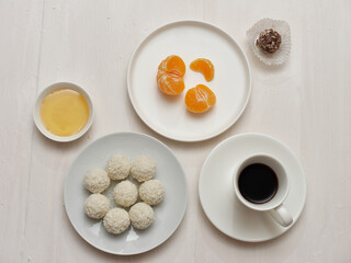 breakfast with coffee and tangerine, raffaello 