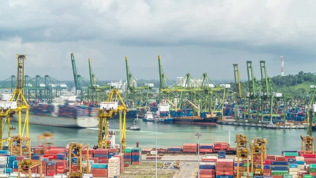 Commercial port of Singapore timelapse. Bird eye panoramic view of busiest Asian cargo port