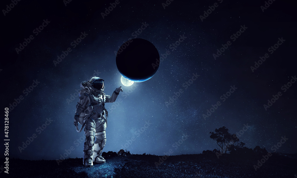 Aufkleber astronaut walking on an unexplored planet