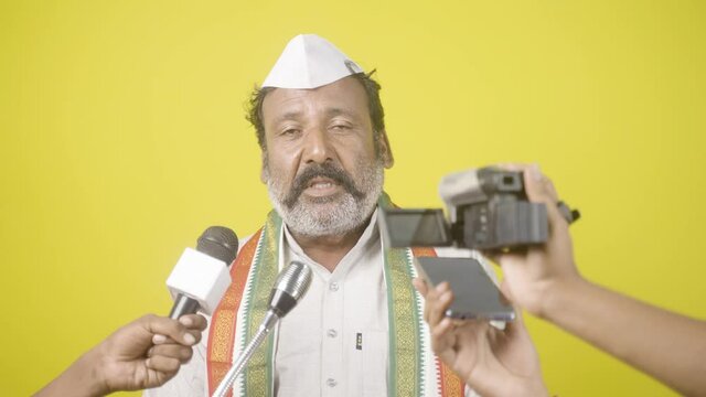Political person answering to media reporter questions by looking camera - Concept of interviewing politician or announcement about political news.