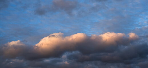 Naklejka na ściany i meble sunset over the clouds 