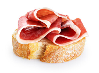 Toasted bread with Spanish jamon serrano ham isolated on white background. With clipping path.
